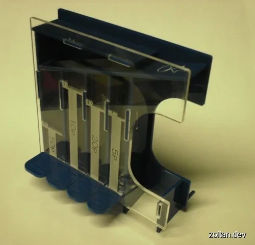 A laser-cut coin sorter.