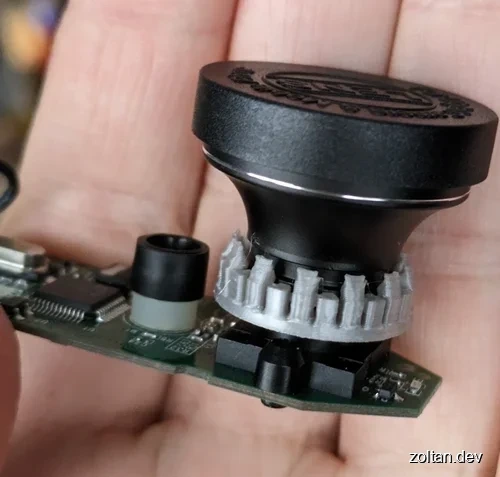 A fisheye lens adapter for a Logitech C310 webcam.