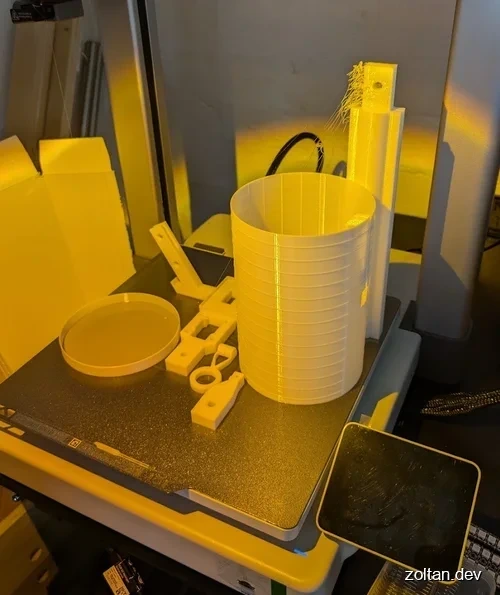 3D printed objects in various shapes and sizes.