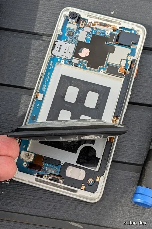 A smartphone LiPo battery inflated after a failure.
